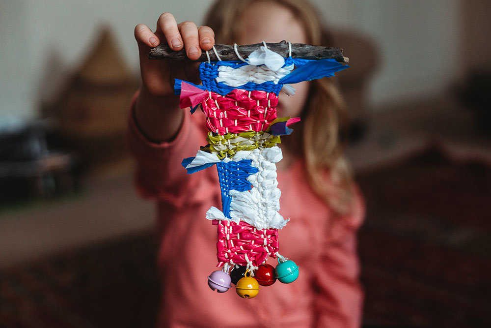 Weaving with plastic using a cardboard loom!